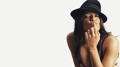 Woman hats Michelle Rodriguez models