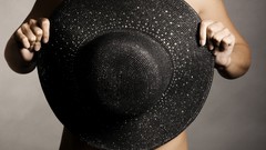 Woman hats strategic covering