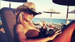 Woman hats sunglasses blondes V sign
