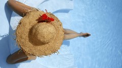 Woman hats swimming pools