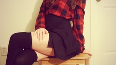 Woman Headless sitting skirts knee socks checkered clothing 