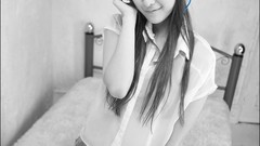 Woman headphones beds asians green eyes brunettes selective 