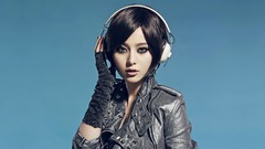 Woman headphones blue background Chinese asians brunettes 