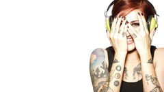 Woman headphones white background tattoos redheads