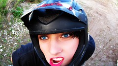 Woman helmets biking downhill