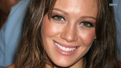 Woman Hilary Duff faces smiling