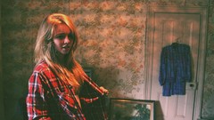 Woman home blondes indoors checkered clothing