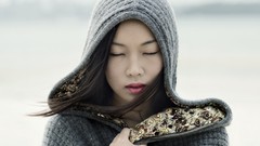 Woman hood asians closed eyes