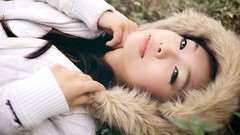 Woman hoodies asians smiling lying down