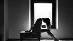 Woman interior monochrome window panes