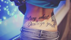 Woman jeans back tattoos