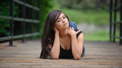 Woman jeans brunettes lying down takara