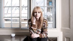 Woman jeans Jumper sitting blondes long hair blue eyes singers 