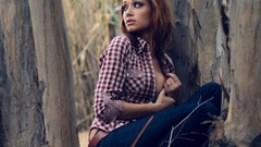 Woman jeans shirts belts outdoors redheads looking back 