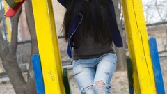 Woman jeans young smiling brunettes laughing playground Malina A