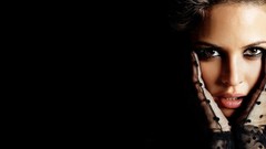 Woman Josie Maran faces