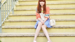 Woman Jumper Camille sitting fashion redhead outdoors asians 