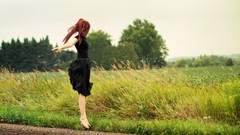 Woman jumping redheads