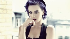 Woman katy perry singers purple hair blurred background hands 