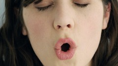 Woman kissing closed eyes zooey deschanel