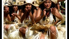 Woman kissing dancers Tahiti
