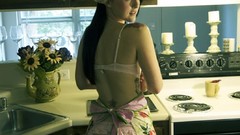 Woman kitchen nude