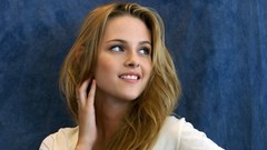 Woman Kristen Stewart faces Actress blondes smiling