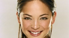 Woman Kristin Kreuk faces Actress smiling