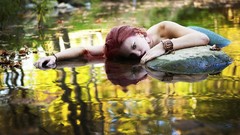 Woman lakes mermaids