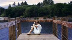 Woman lakes piers barefoot white dress