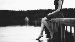 Woman lakes piers legs grayscale