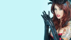 Woman latex blue background gloves tattoos blue eyes brunettes 