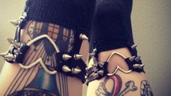 Woman leather spikes legs stockings tattoos lingerie black 