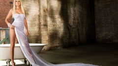 Woman legs blondes white dress see-through