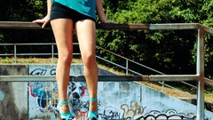 Woman legs outdoors long legs high heels