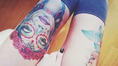 Woman legs tattoos knee socks body parts