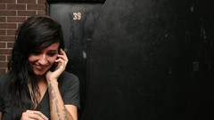 Woman lights phones musican Lights Valerie Poxleitner