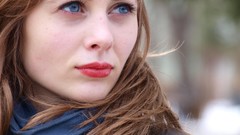 Woman lips blue eyes