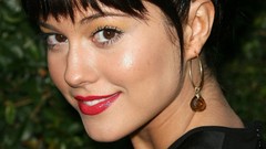 Woman lips Celebrity green background Actress earrings 