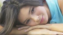 Woman lips faces smiling lying down