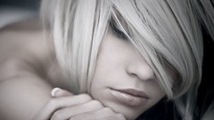 Woman lips looking down blondes thinking