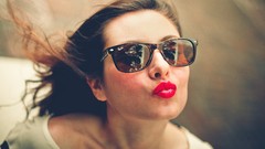 Woman lips sunglasses kissing brunettes models