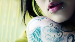 Woman lips tattoos