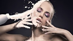 Woman liquid splashes blondes eye shadow closed eyes models