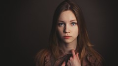 Woman long hair blue eyes brunettes grey background