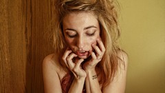 Woman looking down blondes