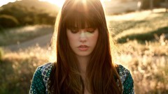 Woman looking down fields redheads