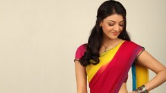 Woman looking down smiling indian hips saree Tollywood Kajal 