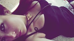 Woman lying down cleavage