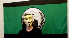 Woman masks Anonymous Guy Fawkes